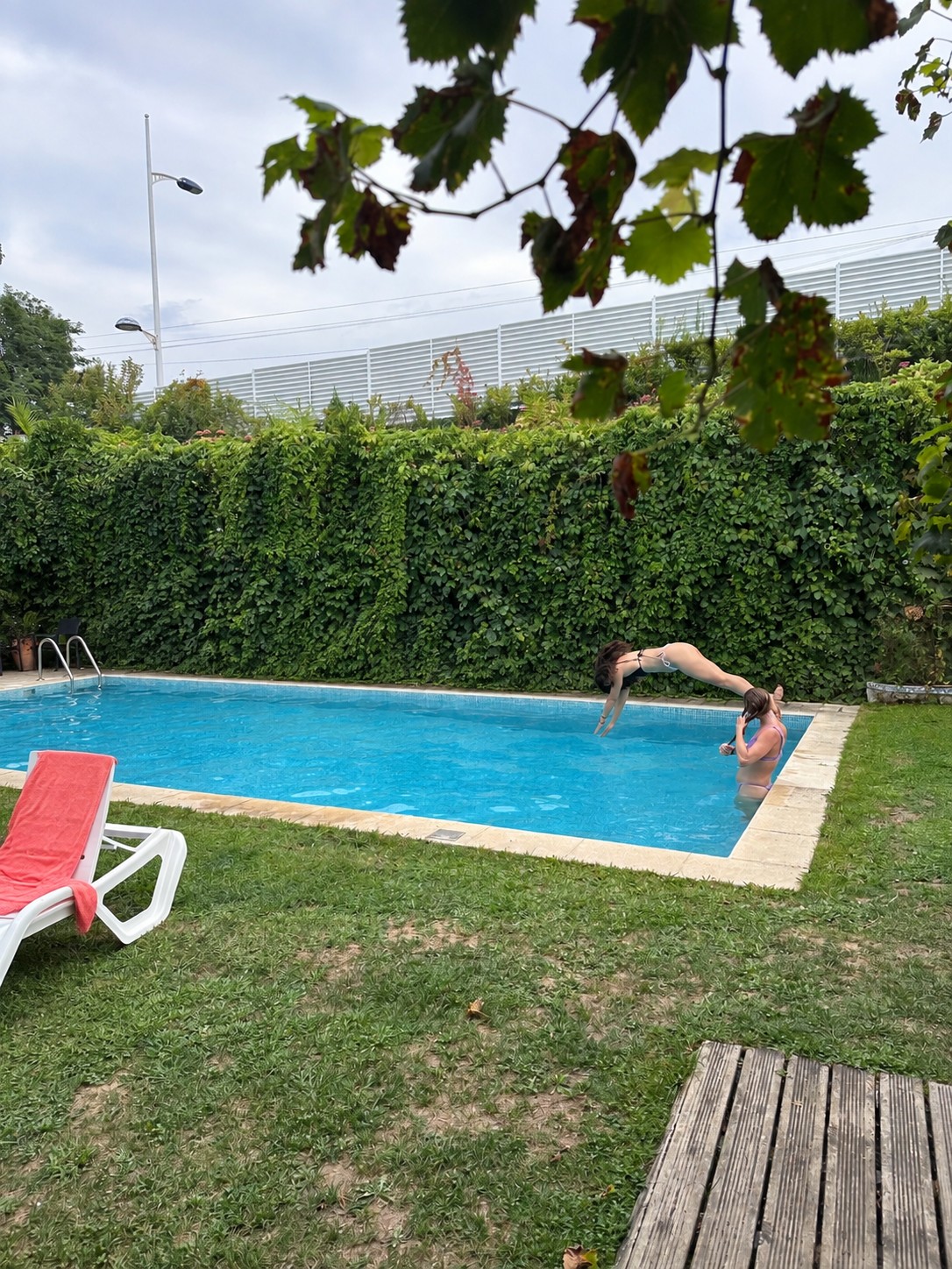 The swimming pool at Casa Azul, with someone mid-dive.