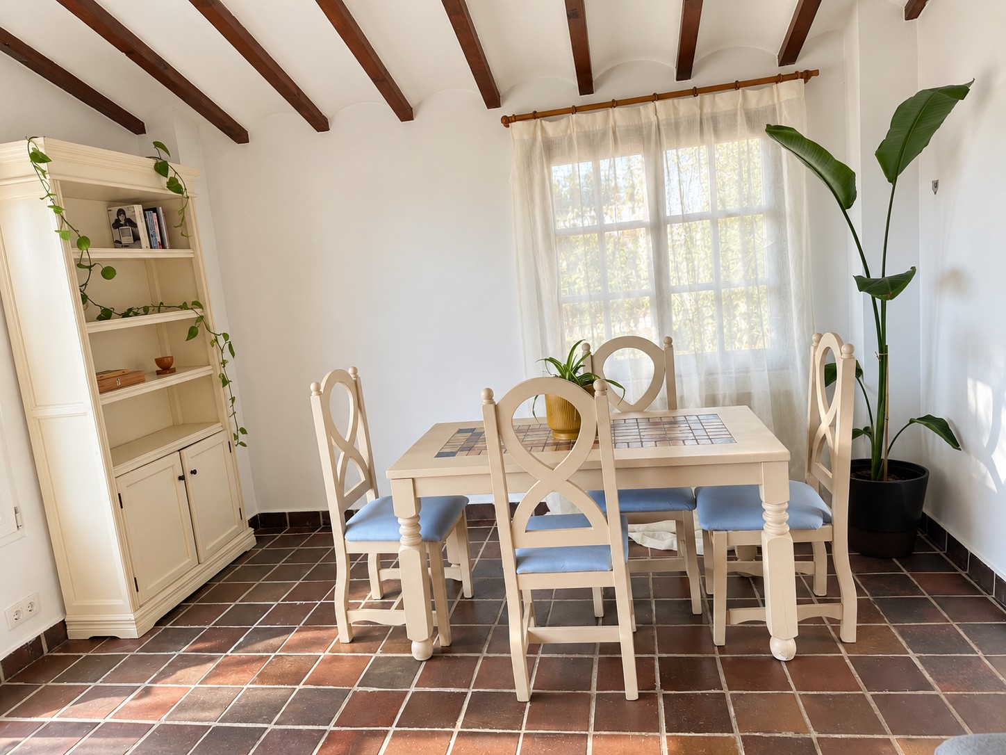 Another view of the dining room, with the new wooden curtain rod and linen curtains.
