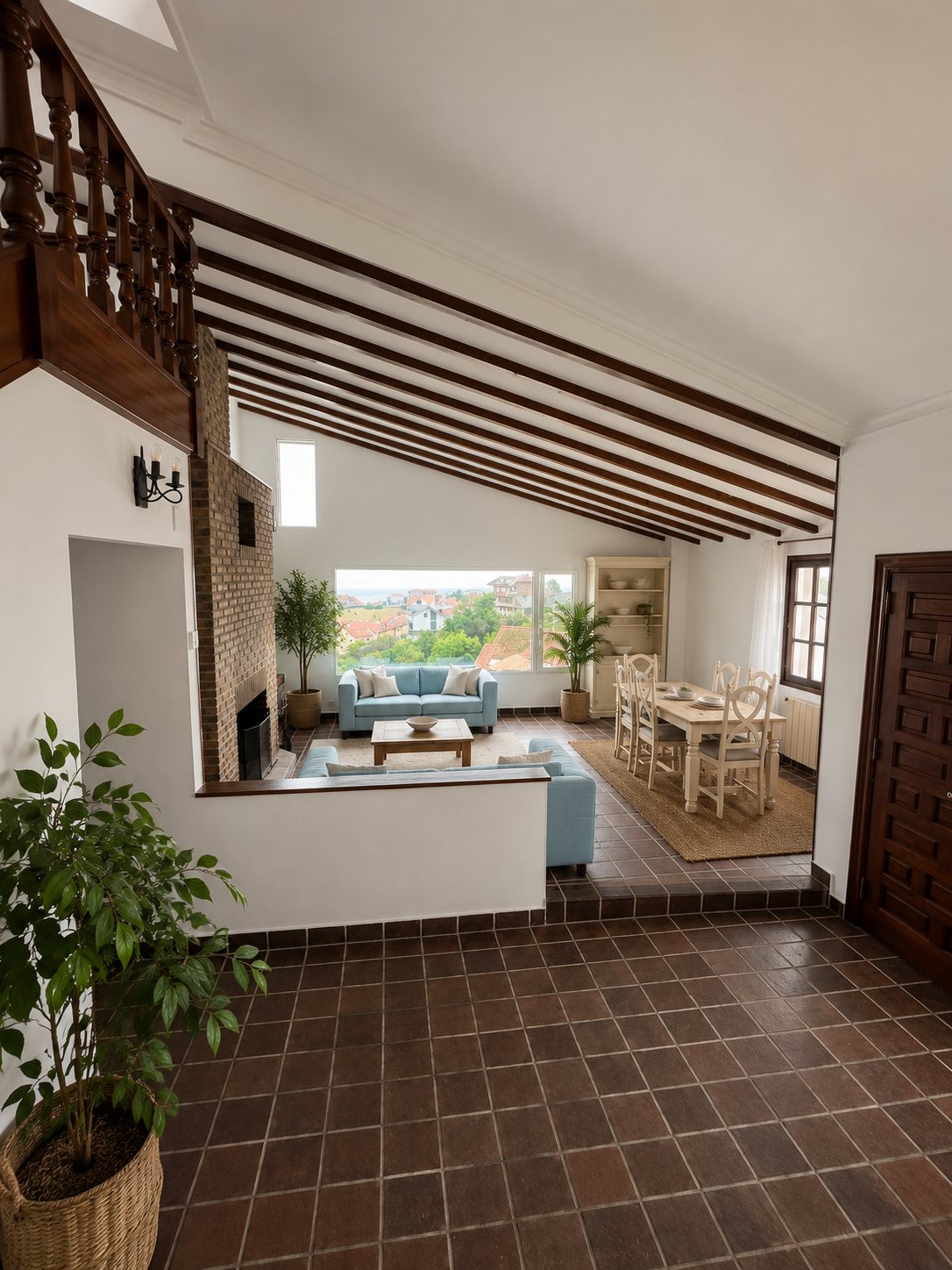 A living and dining room with a wood-beamed ceiling, staircase and dining table, opening onto the garden.